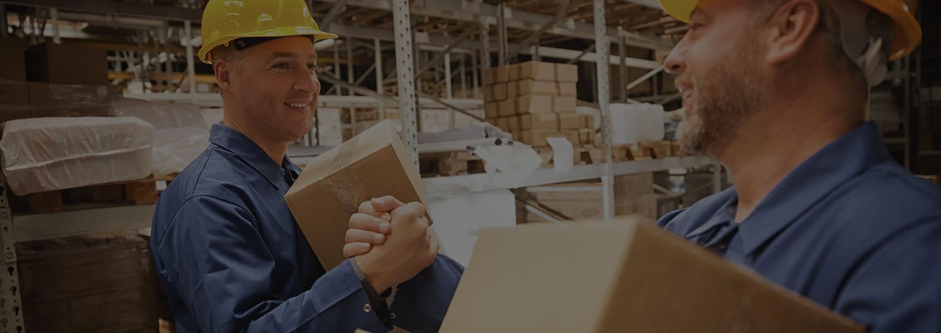 Warehouse team handling packaged cargo